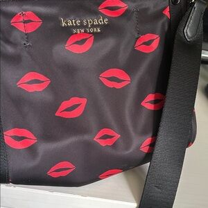 Kate Spade! 7.5 x 7.5 h and w - depth 3.5 in depth Black Crossbody Red Lip 👄
